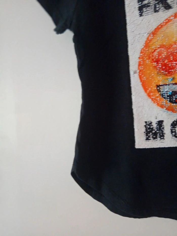Joli Tee-shirt noir. Taille 9 ans - photo numéro 4