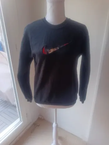 Un sweat taille XS