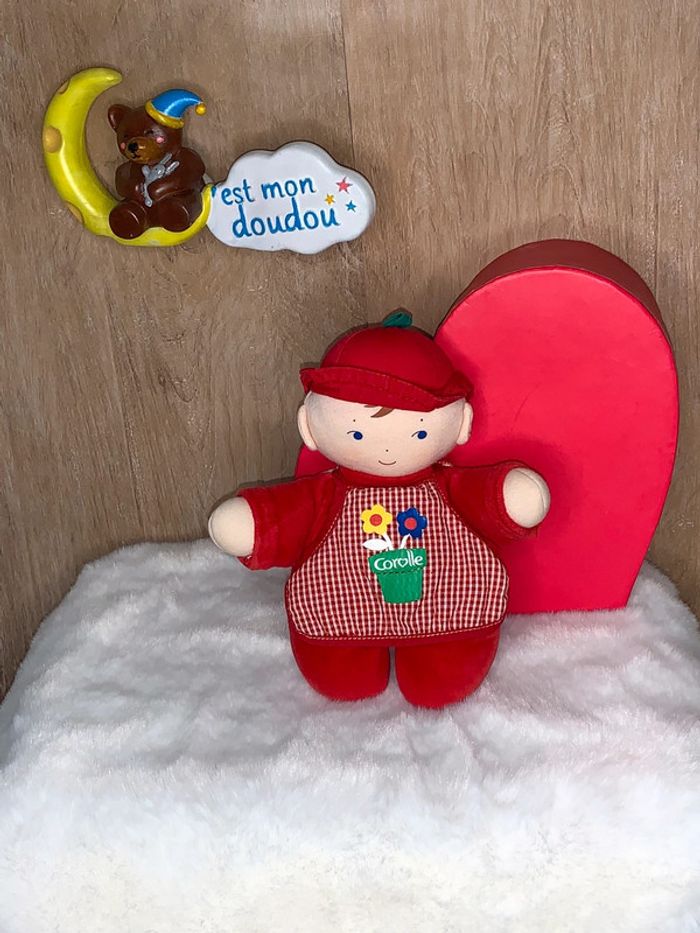 COR48 doudou poupée corolle