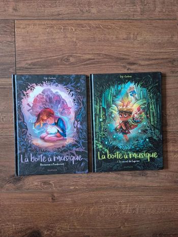 Lot  de 2 bandes  dessinées  La boîte à musique