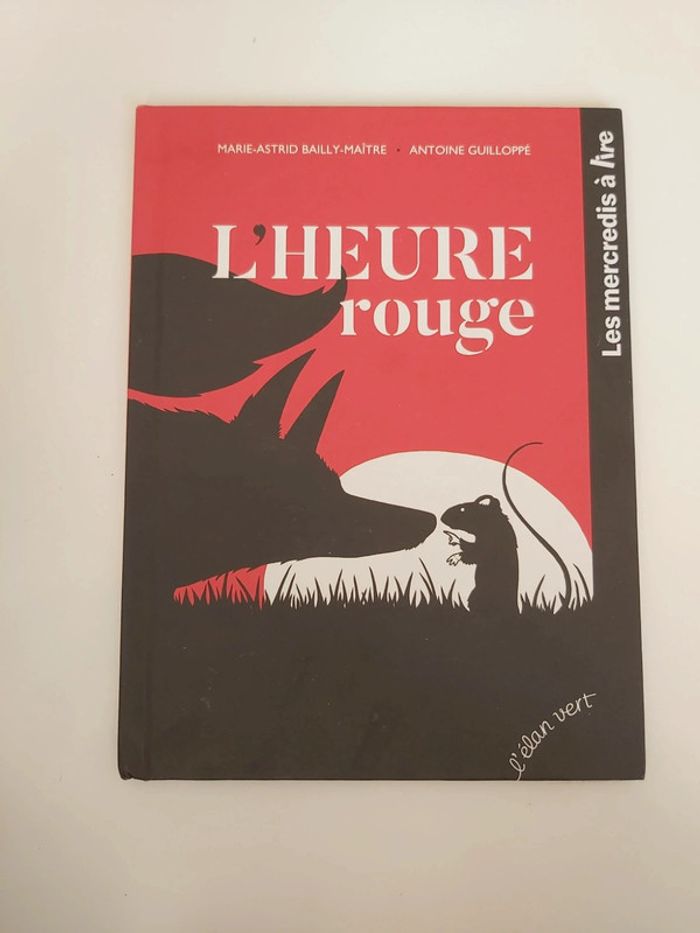 🦋 Livre L'heure Rouge