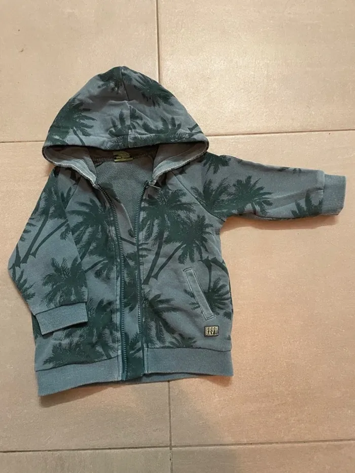 Veste palmiers bleus tape à l’œil