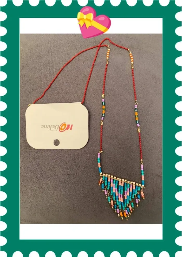 Magnifique sautoir bohème avec pendentif breloques et perles multicolores