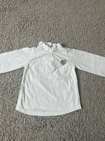 Pull col roulé