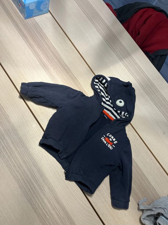 Gilet capuche