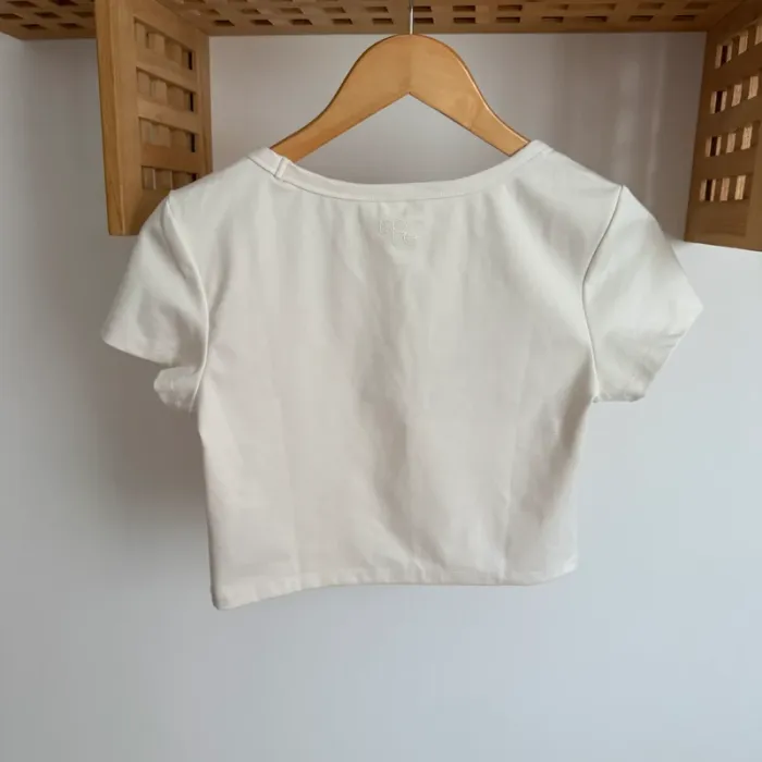 Haut de sport blanc coupe courte Move taille M - photo numéro 4