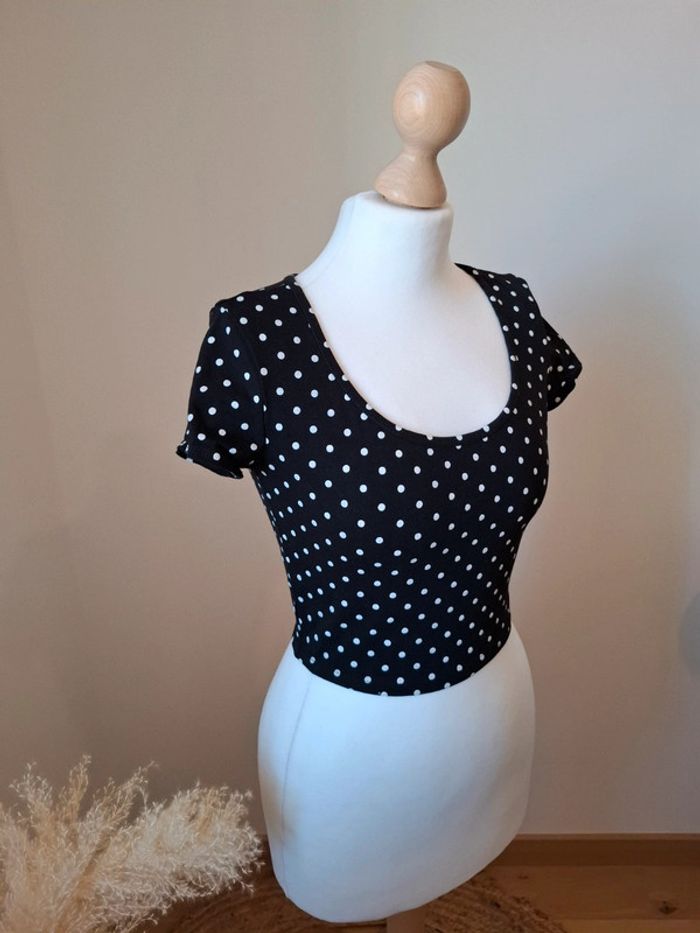 Top court noir à pois blancs New Look taille XS 34