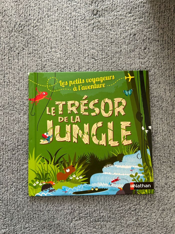 Livre McDo « Le trésor de la jungle » Livre en très bon état juste abîmé à l’extérieur  Collection 2014