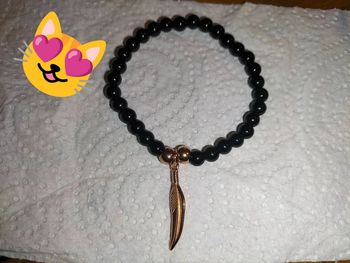 Bracelet onyx noir et plume rose gold