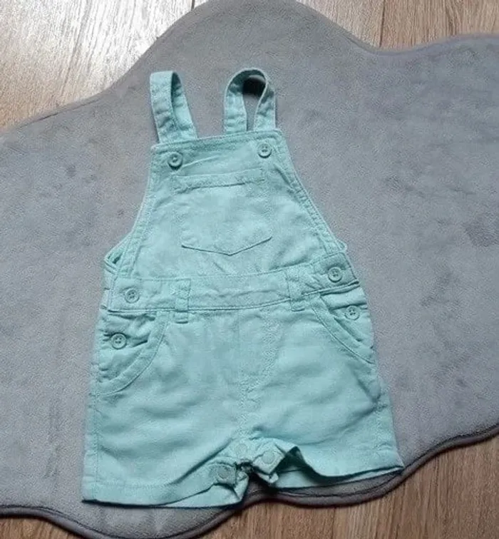 combishort bleu ciel "mes petits cailloux" 9 mois neuve jamais portée