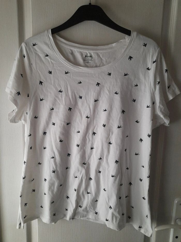 T-shirt blanc avec oiseau 🐦