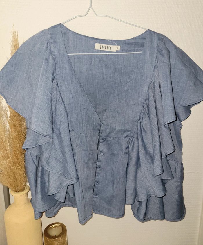Blouse sans manche à volants