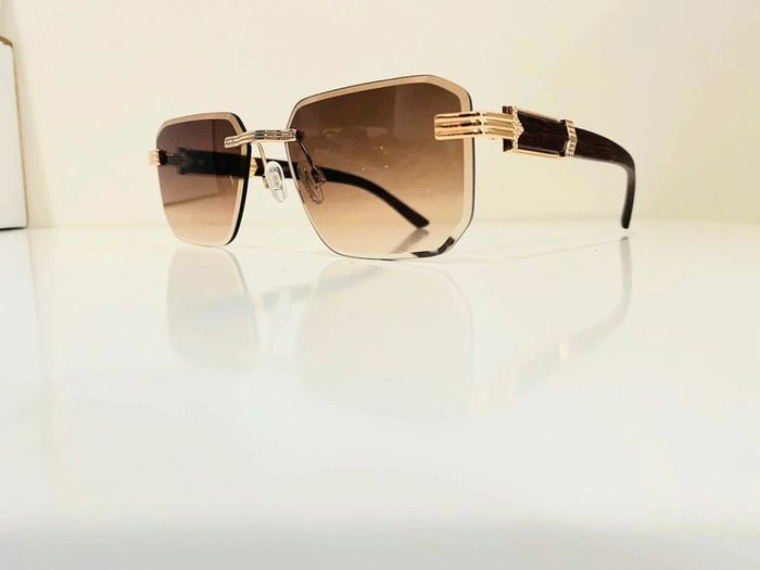 Lunette de soleil mixte sans cadre marron et dorée bras effet bois taille moyenne