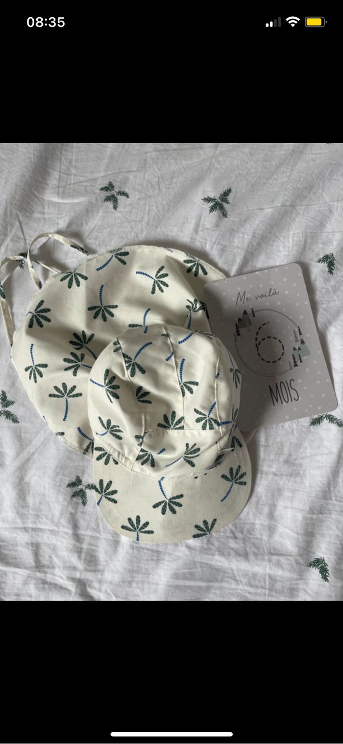 Chapeau casquette protège nuque anti UV bébé 3 6 mois Lassig blanc palmiers