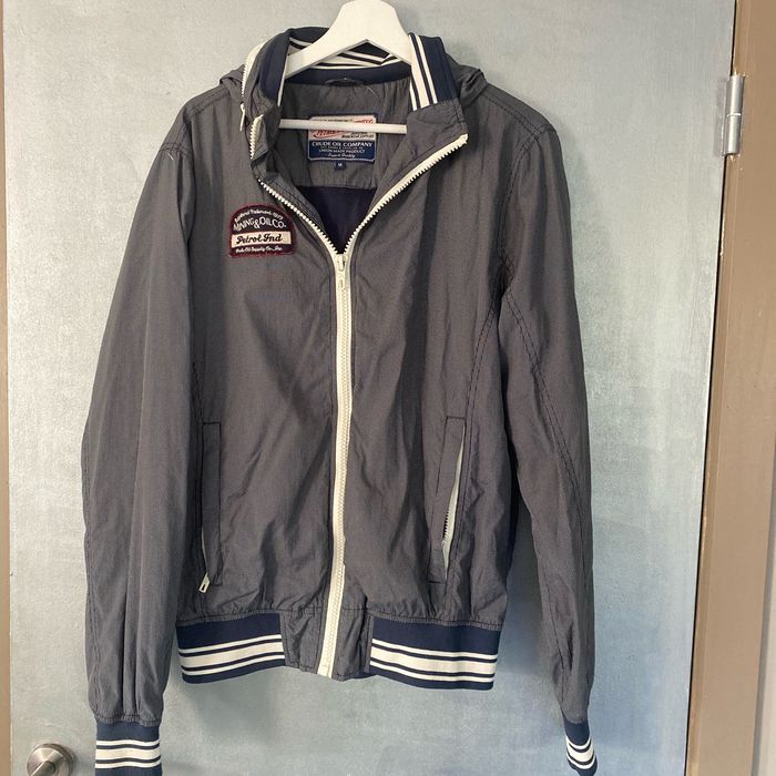 Veste coupe vent imperméable  bleue avec capuche escamotable taille M