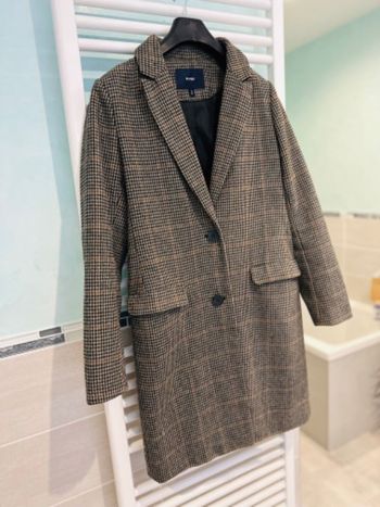 Manteau à carreaux