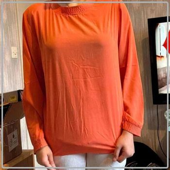 Haut  taille  44 marque Gaston jaunet