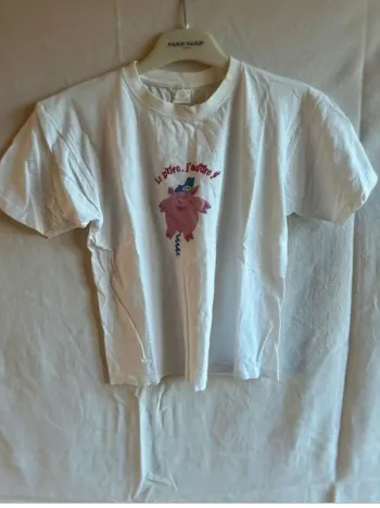 Tee  shirt comiques Le  porc j’adore  taille  10 ans  en  très  bon état