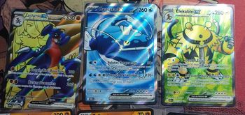 Lot cartes EV10 Rivalités destinées team rocket : carchacrok promo svp 204 + 2 cosmo promo + 2 full art eleka le 212 et oyacata 211 + 12 ex ( dont ho oh nidoking nostenfer persona et carchacrok etc ) Pokemon par Asmodée bloc écarlate et violet 