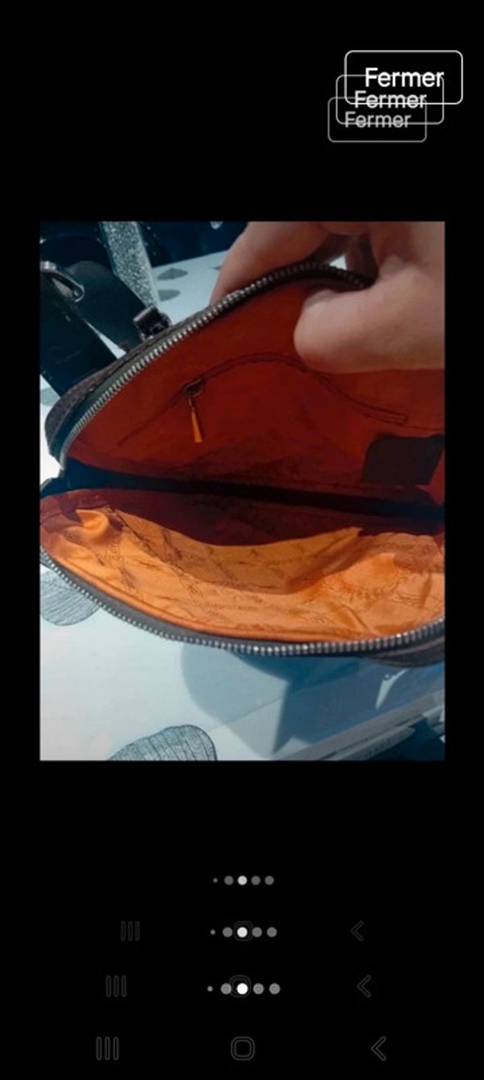 Pochette longchamp homme tt est visible sur les photos - photo numéro 7