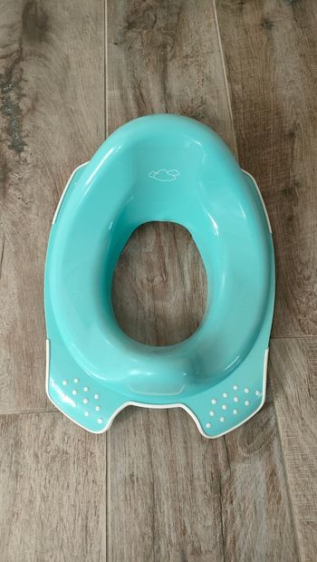 Réducteur de toilettes.