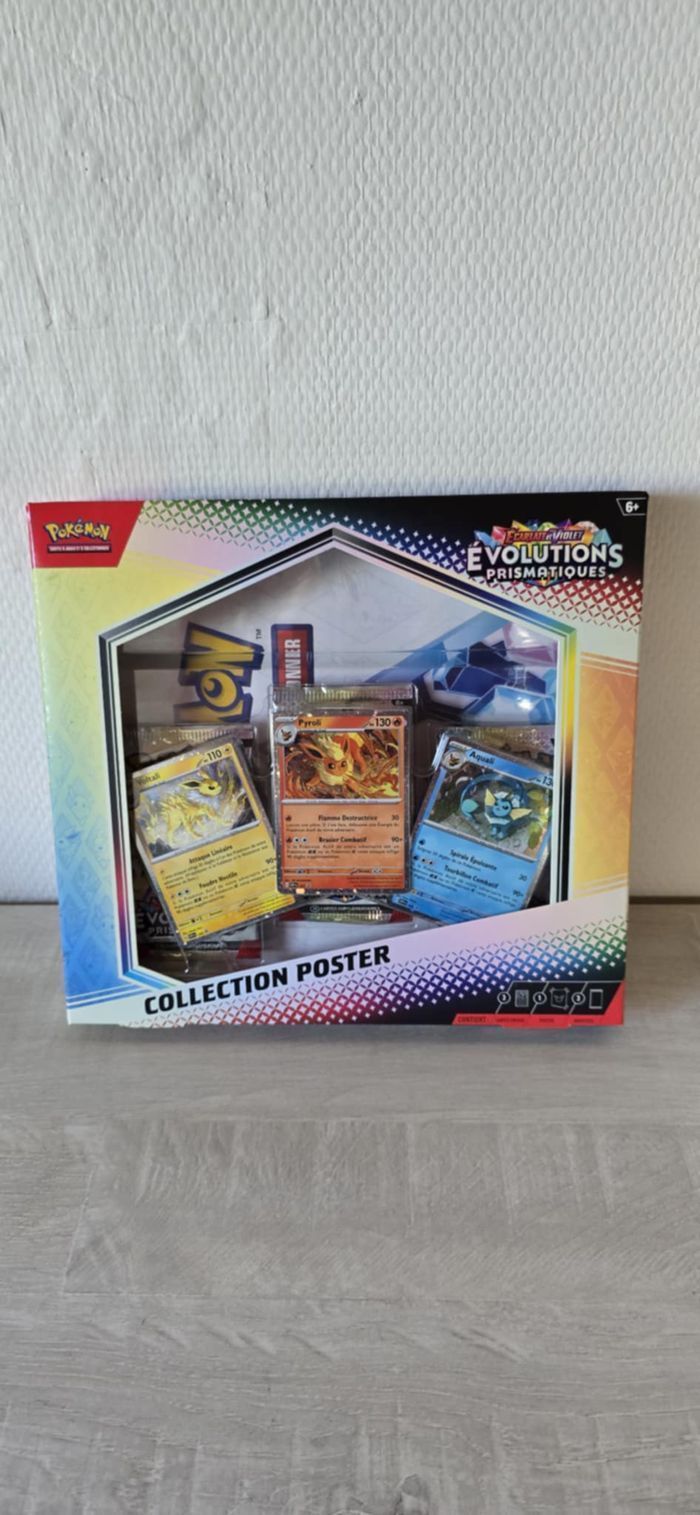 Coffret collection poster évolutions prismatiques 8.5 scellé