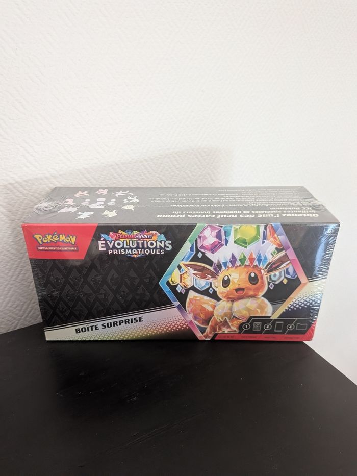 Pokémon coffret surprise 4 Boosters Évolution prismatique Ev 8.5 + carte promo stamp EX