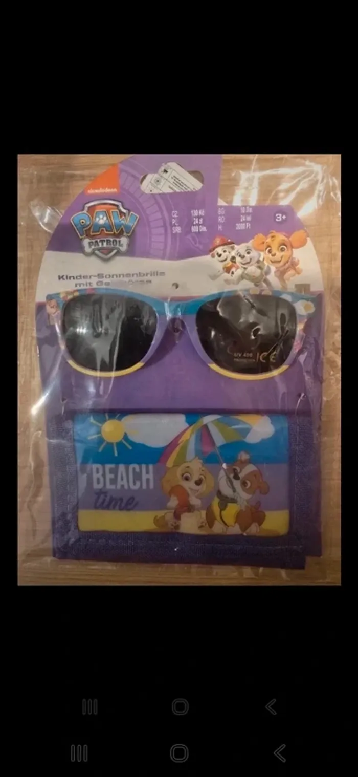 Lunette de soleil Stella paw patrol +porte monaie neuf