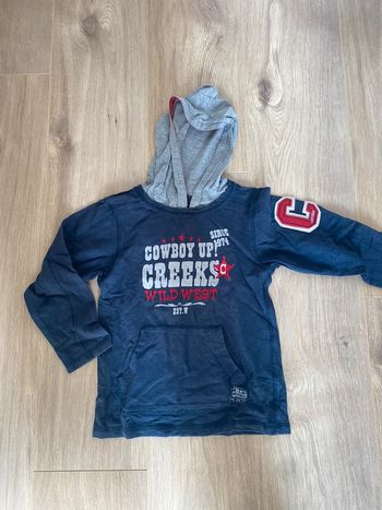 Manche longue à capuche