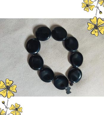 Bracelet noir à médaillon – signé Agatha Paris