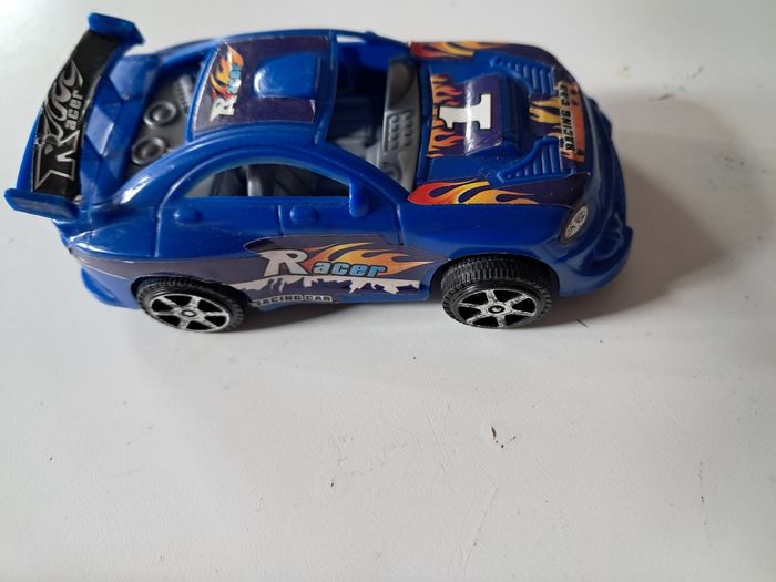 Lot de voitures de courses et une moto - photo numéro 3