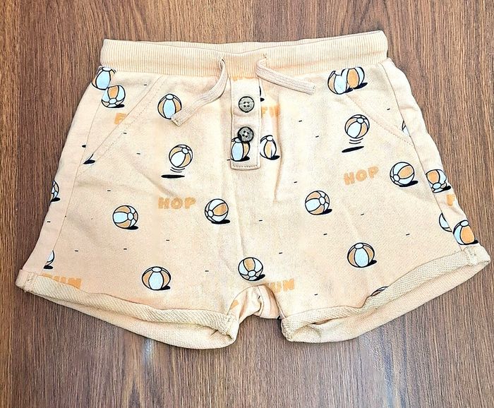 Short enfant garçon Kiabi – 24 mois / 2 ans – orange abricot – ballons de plage