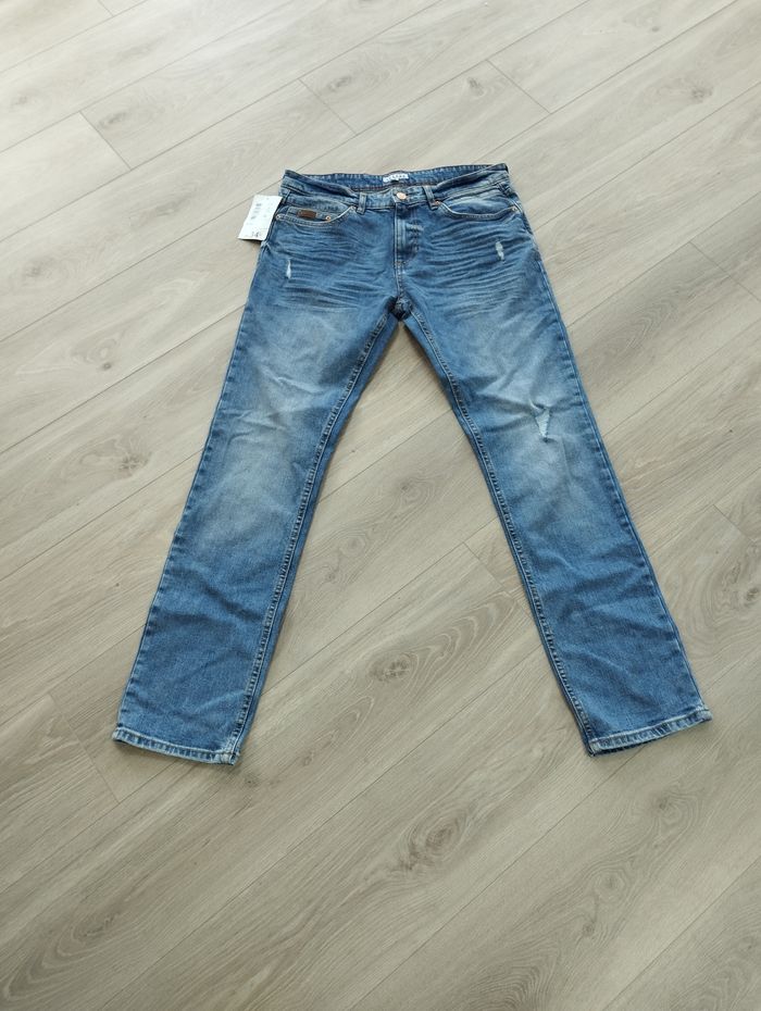 Jean destroy taille 42 neuf