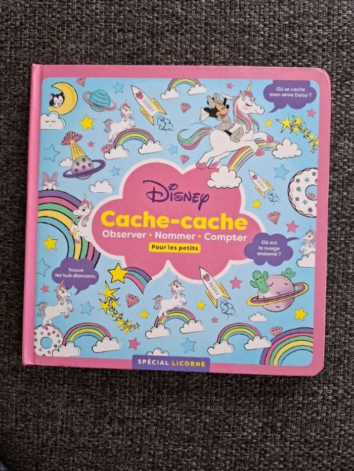 Livre cartonné Disney Cache-cache spécial licorne en très bon état