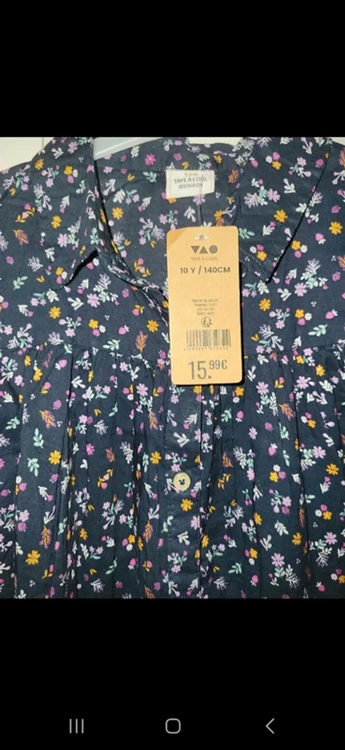 Blouse mauve à fleur tao