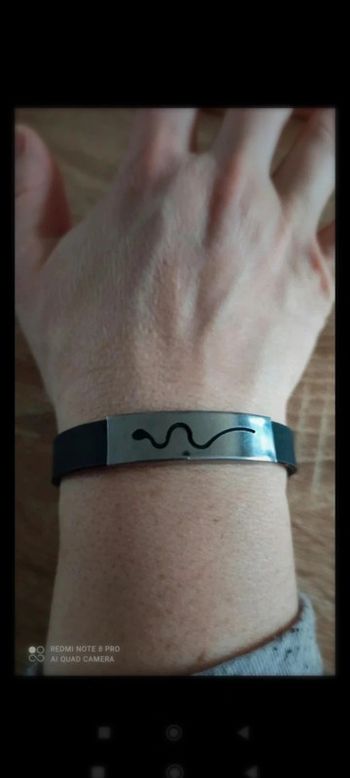 Bracelet noir plaque argenté acier motif serpent mixte