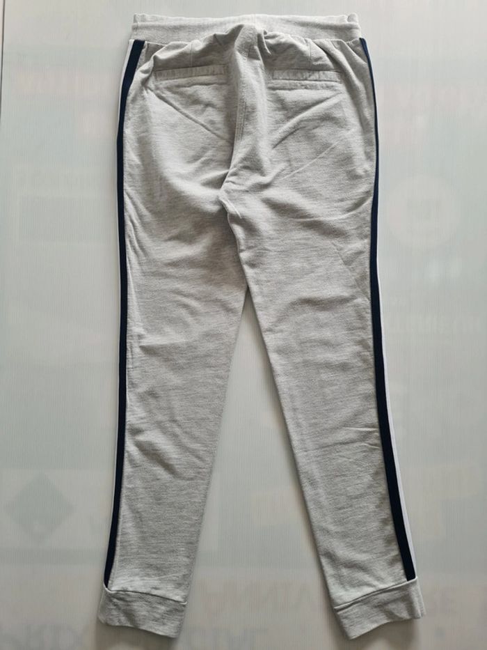 Pantalon jogging fille gris avec bandes marine et blanc sur les côtés taille 14 ans - photo numéro 9