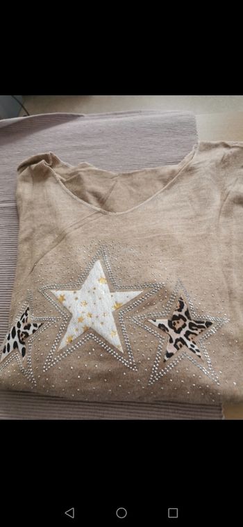 Pull beige étoiles