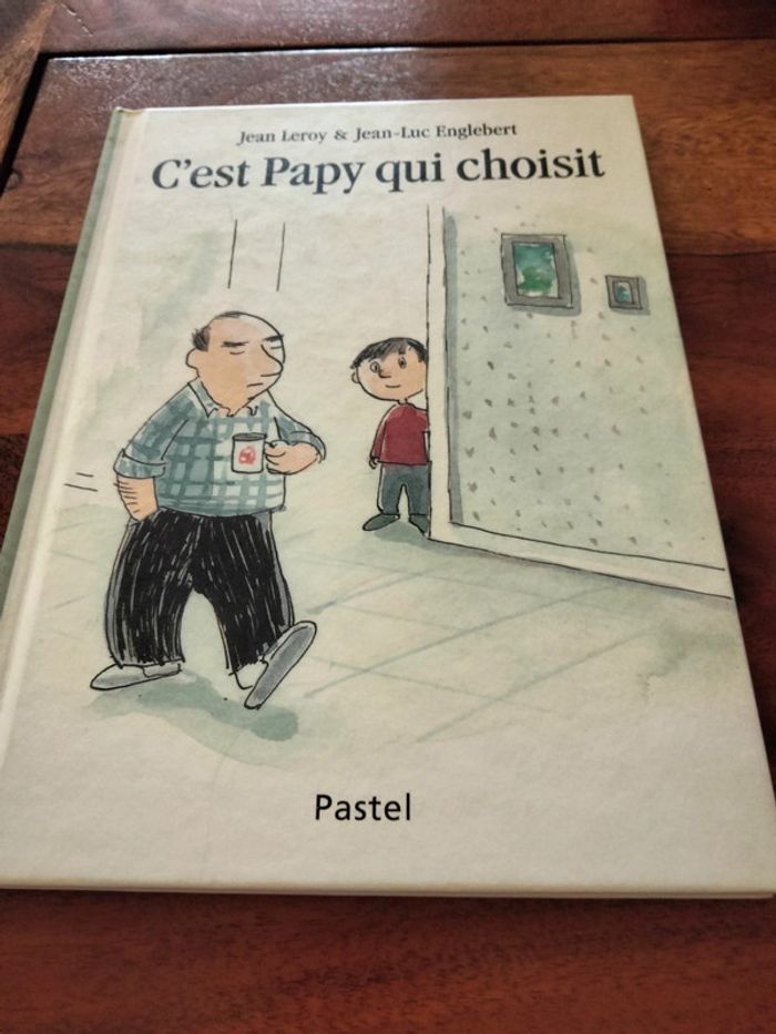 Livre intitulé c'est papy qui choisit pastel école des loisirs