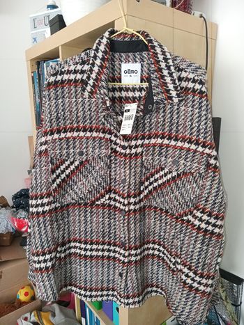 Veste hiver marron et beige.