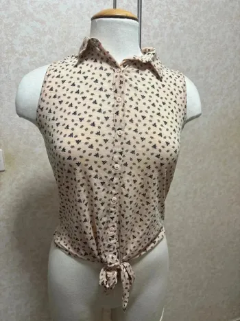 Chemise sans manche taille 34-36 marque kiabi