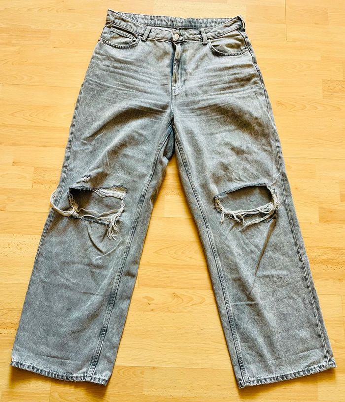 Jean jambes larges troués gris