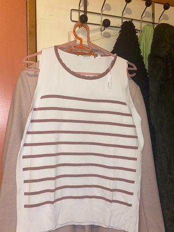 Très jolie pull sans manche