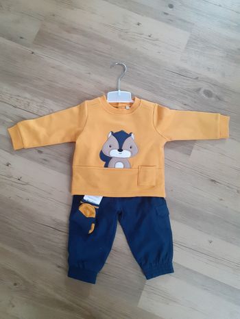 Ensemble neuf jamais porté 12 m