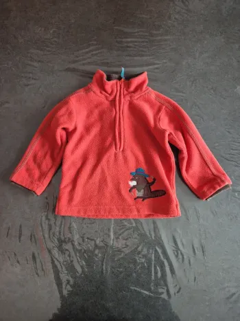 Pull polaire avec ouverture au col