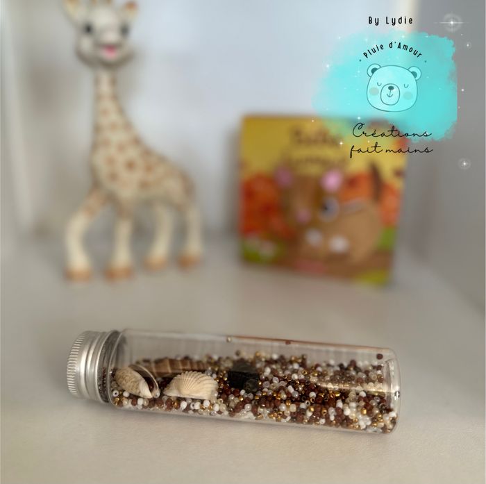 Bouteille sensorielle coquillages đ