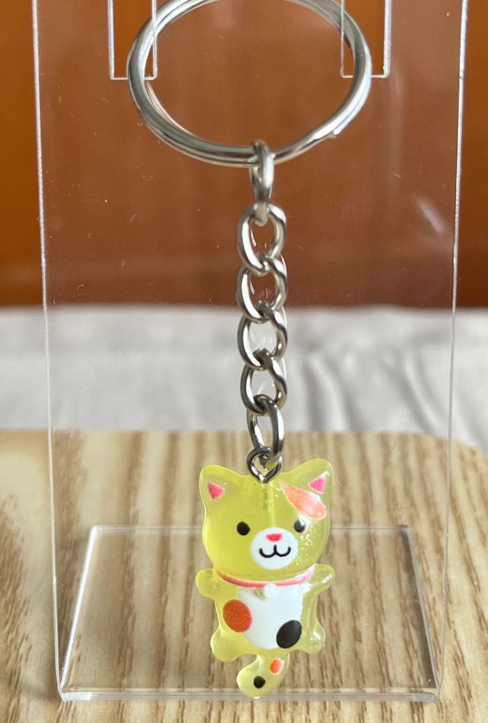 Porte clé chat jaune