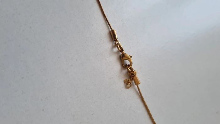 Collier sautoir doré pompon rose moutarde Louise misha - photo numéro 5