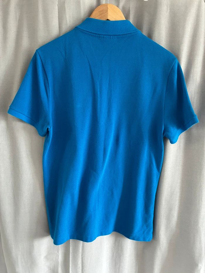 Polo Lacoste bleu électrique taille m très bon état - photo numéro 3