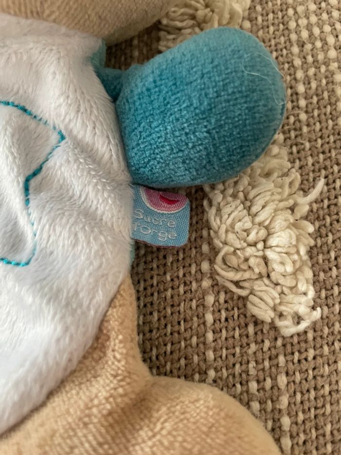 Peluche doudou plat 18cm sucre d’orge ours bleu et blanc très bon état - photo numéro 3